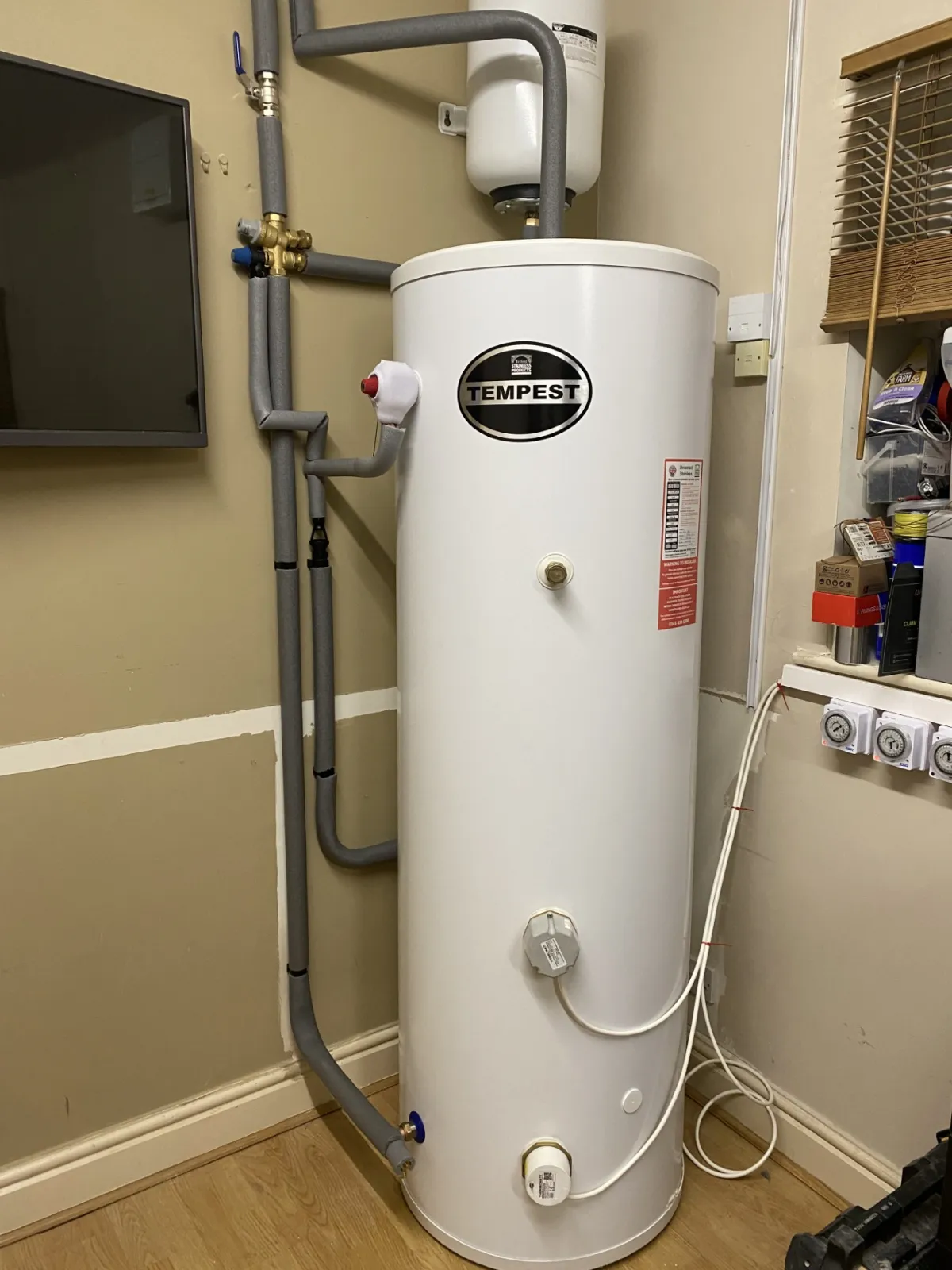 Unvented hot water cylinder installed with new pipework and safety valves